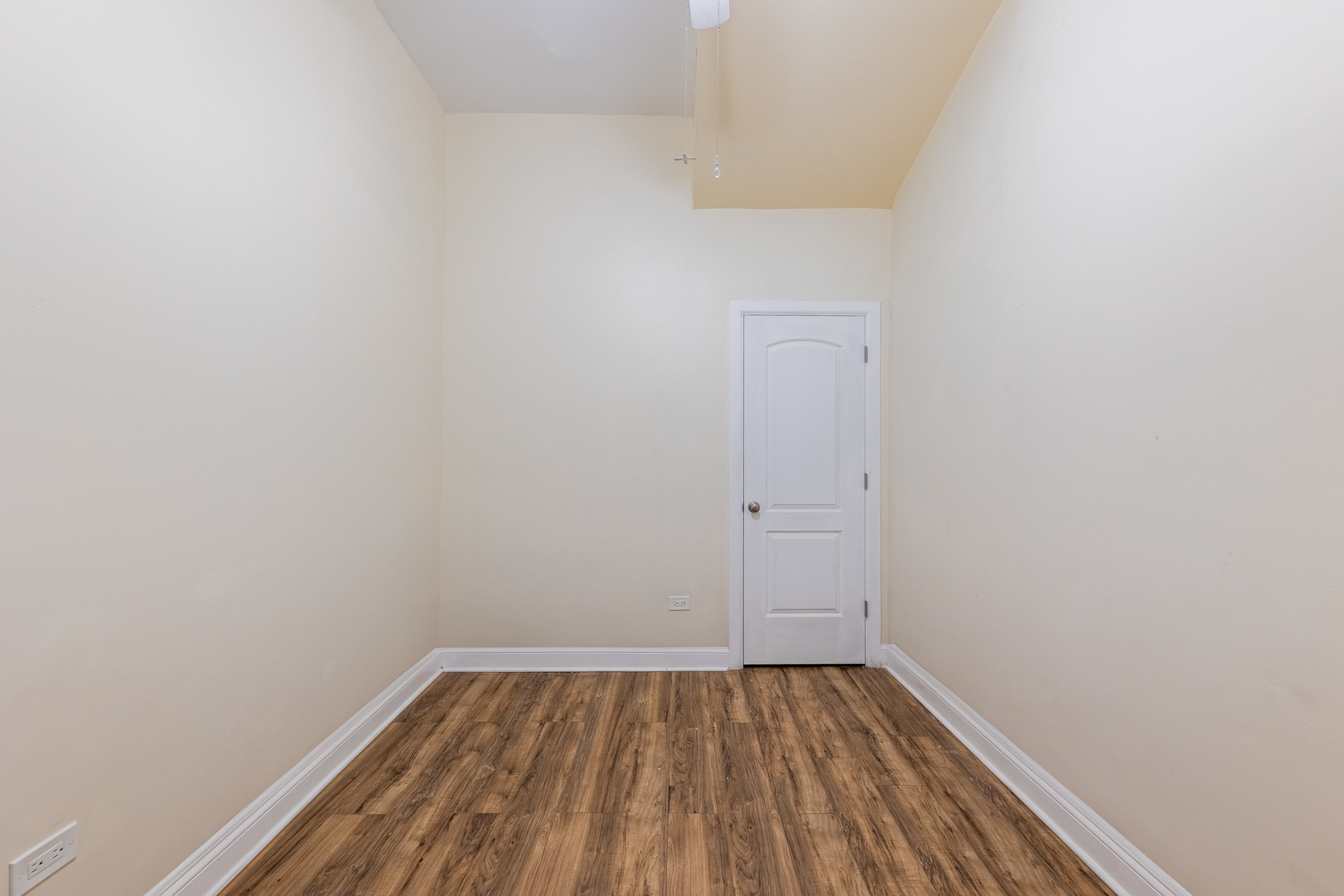 4549 South Wabash Avenue, Unit 1 Chicago, IL 60653 - Photo 14 of 44 a view of a small space with wooden floor and a window