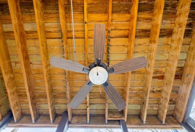 a view of a door with wooden floor