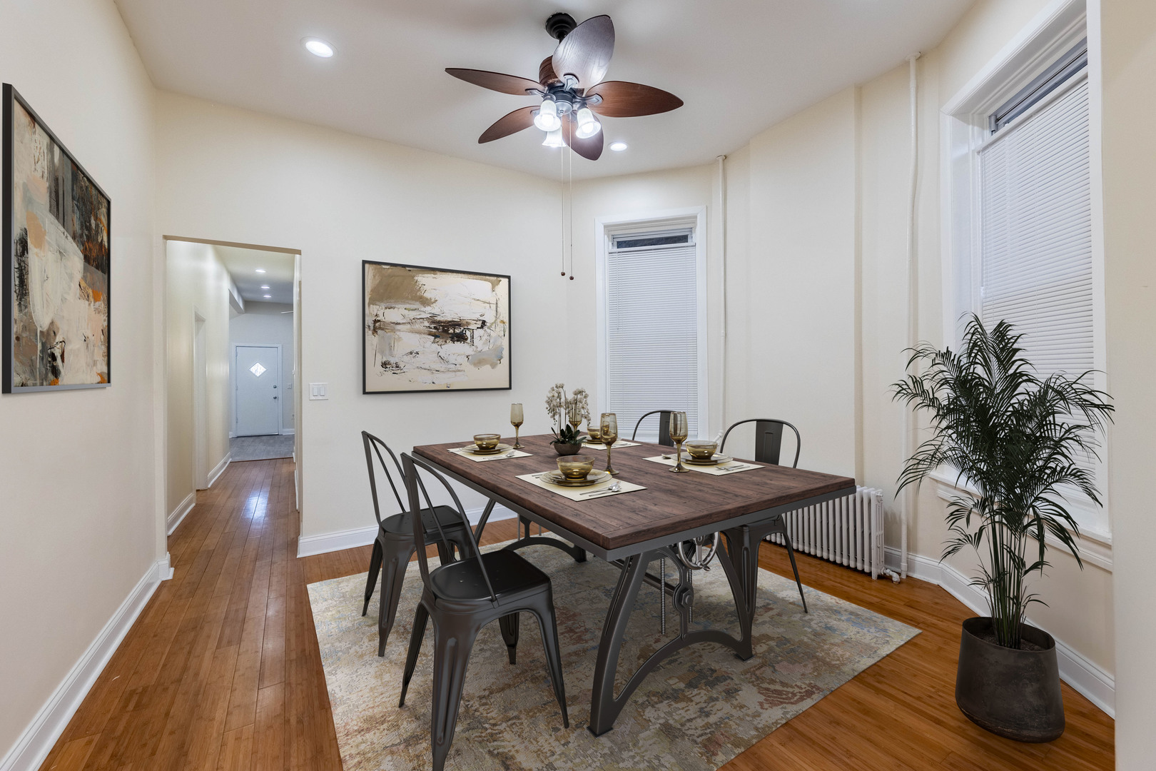 4549 South Wabash Avenue, Unit 1 Chicago, IL 60653 - Photo 6 of 44 a view of a dining room with furniture and wooden floor