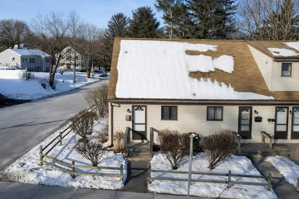front view of a house with a patio