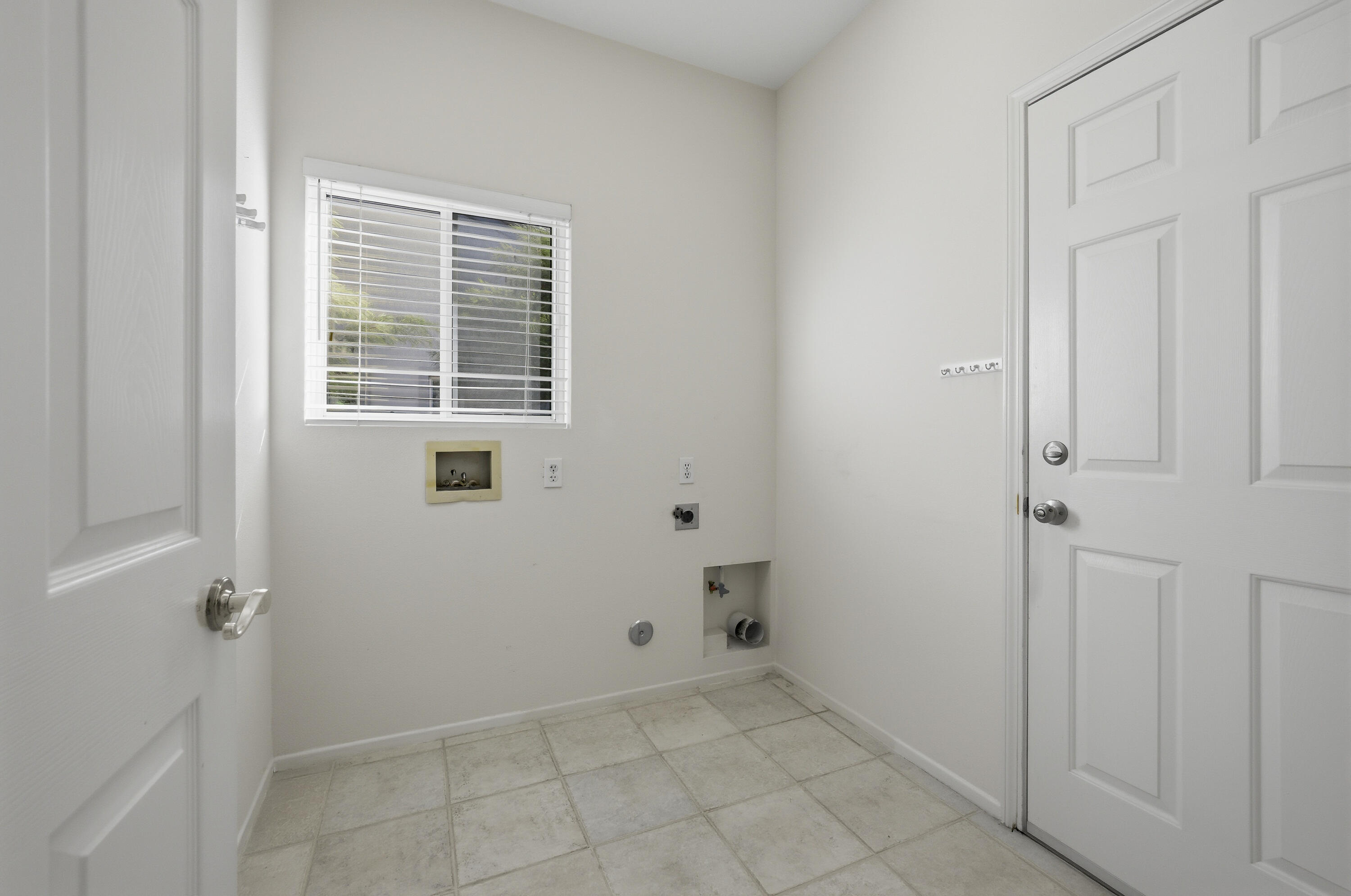 78764 Putting Green Drive Palm Desert, CA 92211 - Photo 23 of 23 a view of an empty room with a window