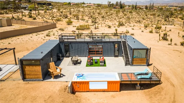 a view of a swimming pool with a lounge chair