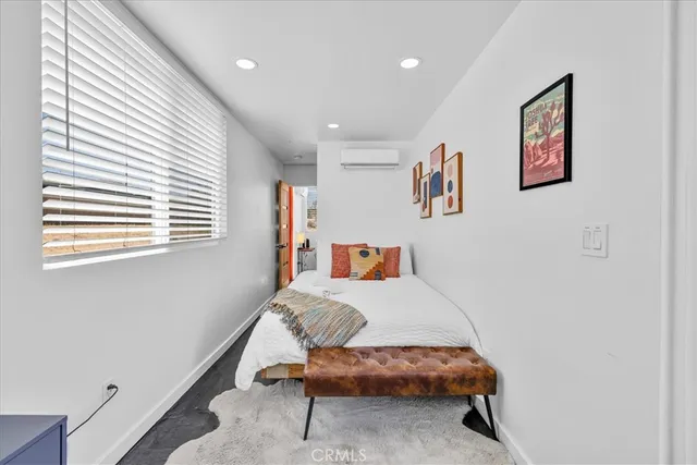 a view of a patio with a table and chairs