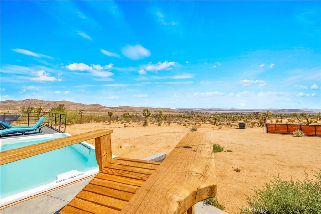 6816 Saddleback Road Joshua Tree, CA 92252 - Photo 37 of 71 a view of an ocean and beach