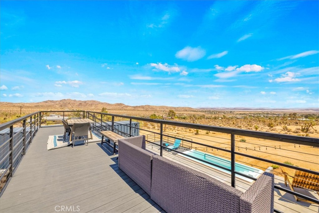 6816 Saddleback Road Joshua Tree, CA 92252 - Photo 42 of 71 a view of ocean from a balcony