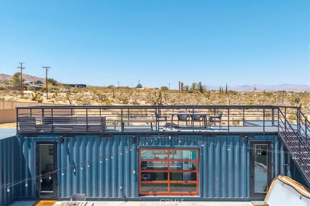 6816 Saddleback Road Joshua Tree, CA 92252 - Photo 49 of 71 a view of a balcony with city view