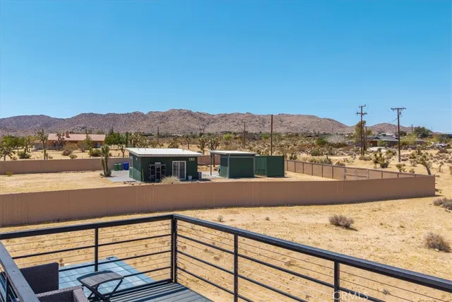an aerial view of beach and an ocean