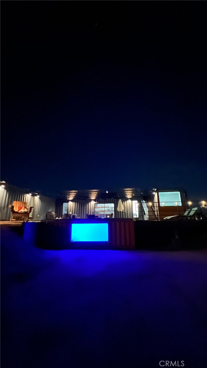 6816 Saddleback Road Joshua Tree, CA 92252 - Photo 58 of 71 a city view with swimming pool and outdoor space