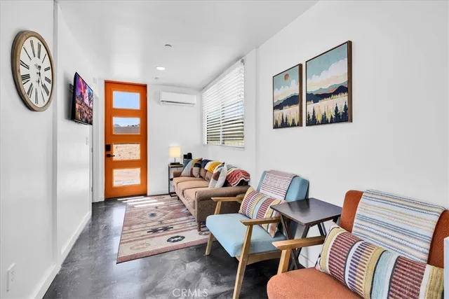 a large kitchen with stainless steel appliances a refrigerator and a sink