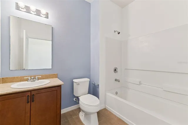 a bathroom with a bath tub