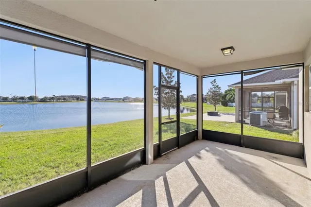 a view of a house with backyard porch and garden