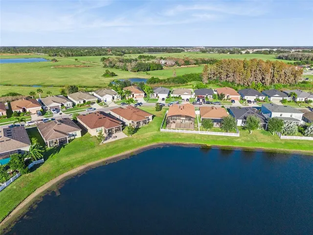 an aerial view of a house with a garden
