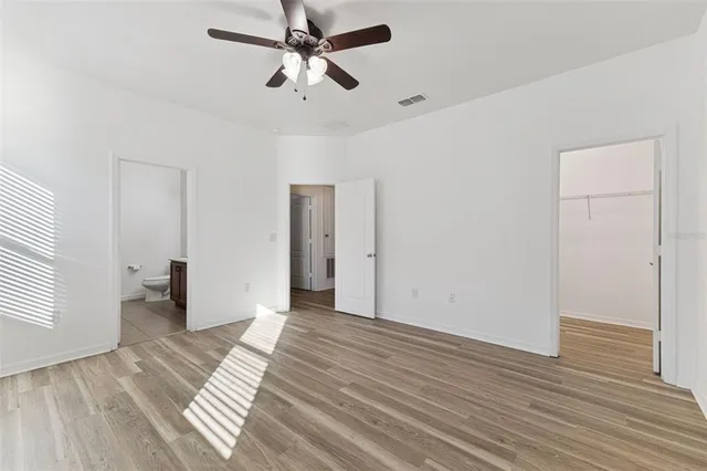 a view of a glass door and a yard