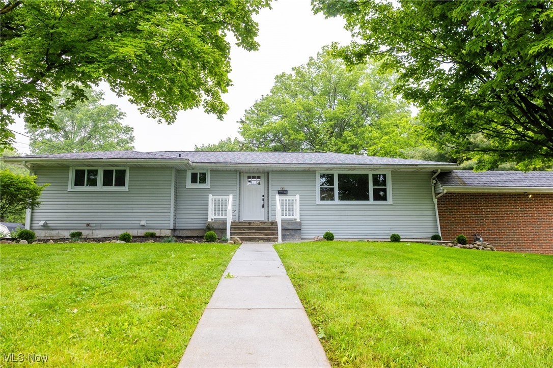 55 Elm Street Rittman, OH 44270 - Photo 3 of 46 Ranch-style house with a front yard
