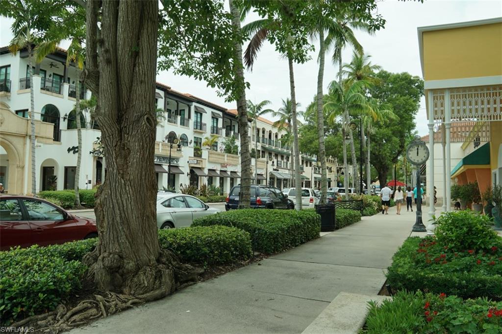 480 5th Street South, Unit 102 Naples, FL 34102 - Photo 20 of 24 a view of a yard in front of a building