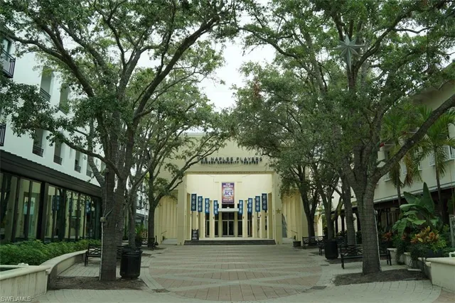 a view of a building and trees