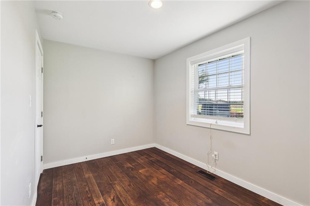 1188 East Lake Road Transfer, PA 16154 - Photo 18 of 32 an empty room with a window