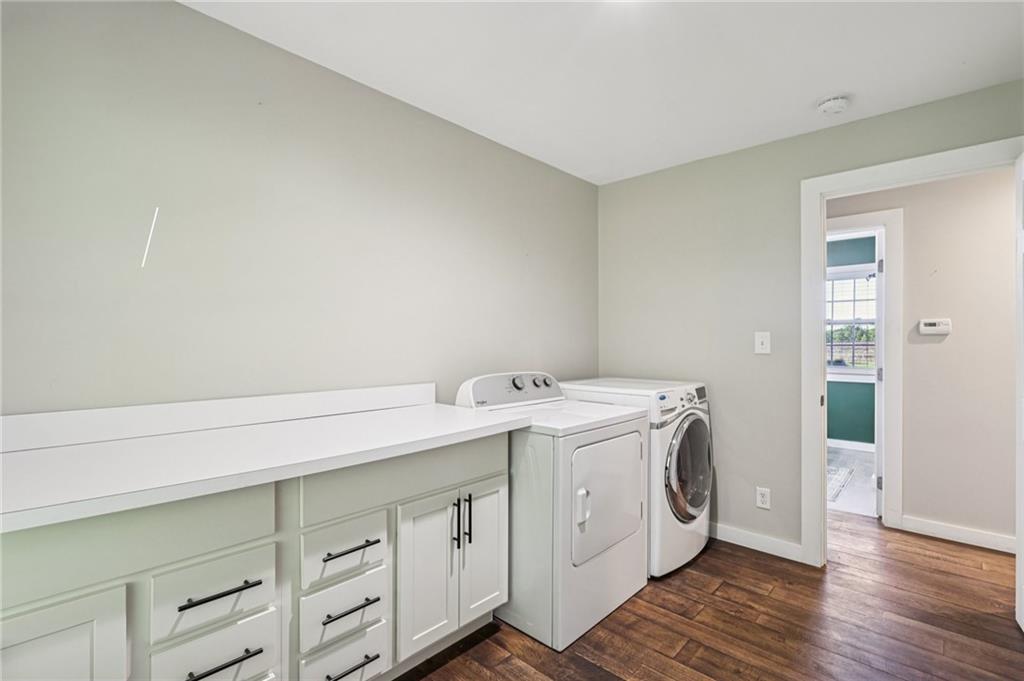1188 East Lake Road Transfer, PA 16154 - Photo 19 of 32 a utility room with cabinets washer and dryer