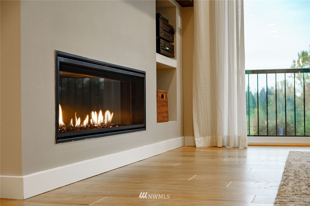 23711 9th (lot 74) Avenue Southeast, Unit E Bothell, WA 98021 - Photo 11 of 21 a view of room with window and fireplace