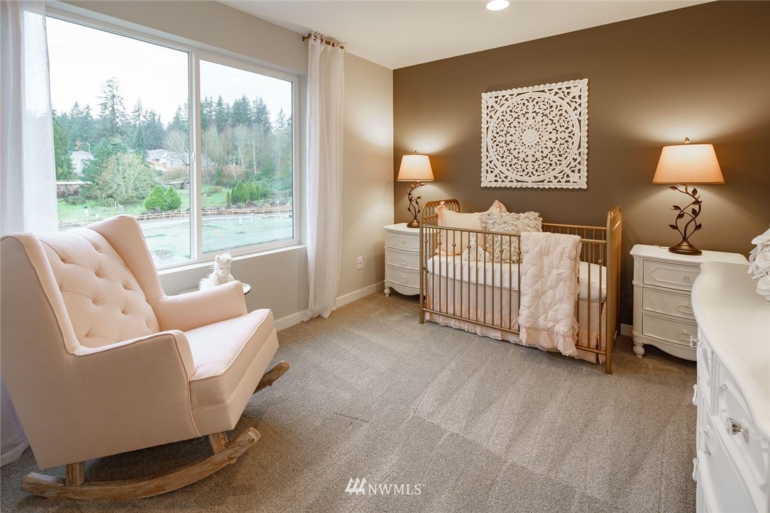 23711 9th (lot 74) Avenue Southeast, Unit E Bothell, WA 98021 - Photo 19 of 21 a bed room with furniture and a window