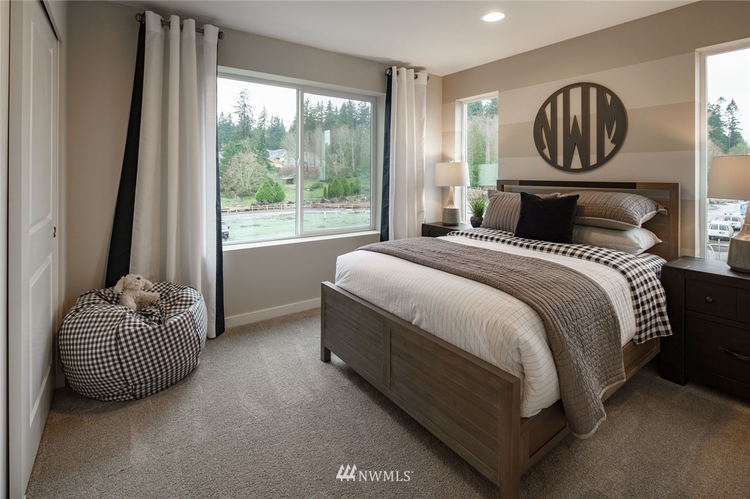 23711 9th (lot 74) Avenue Southeast, Unit E Bothell, WA 98021 - Photo 20 of 21 a bedroom with bed and window