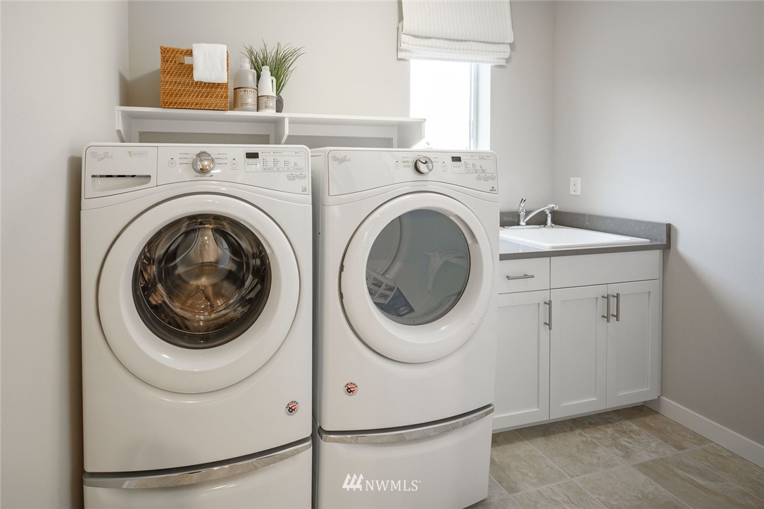 23711 9th (lot 74) Avenue Southeast, Unit E Bothell, WA 98021 - Photo 21 of 21 a utility room with dryer and washer