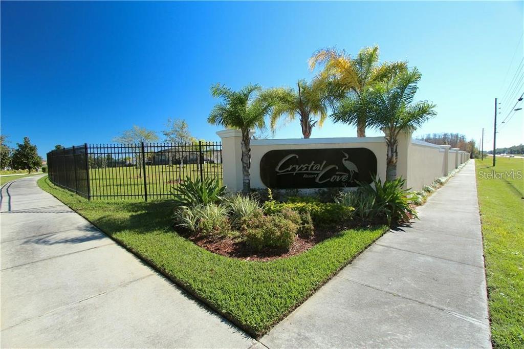 957 Emerald Green Court Kissimmee, FL 34746 - Photo 22 of 29 a sign on the side of a building