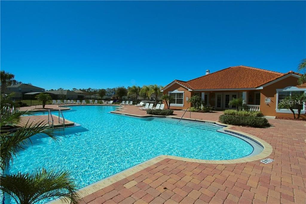 957 Emerald Green Court Kissimmee, FL 34746 - Photo 23 of 29 a view of a house with a yard