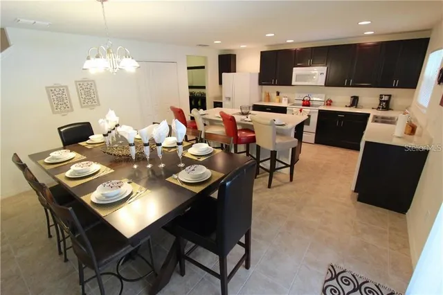 a view of a dining room with furniture