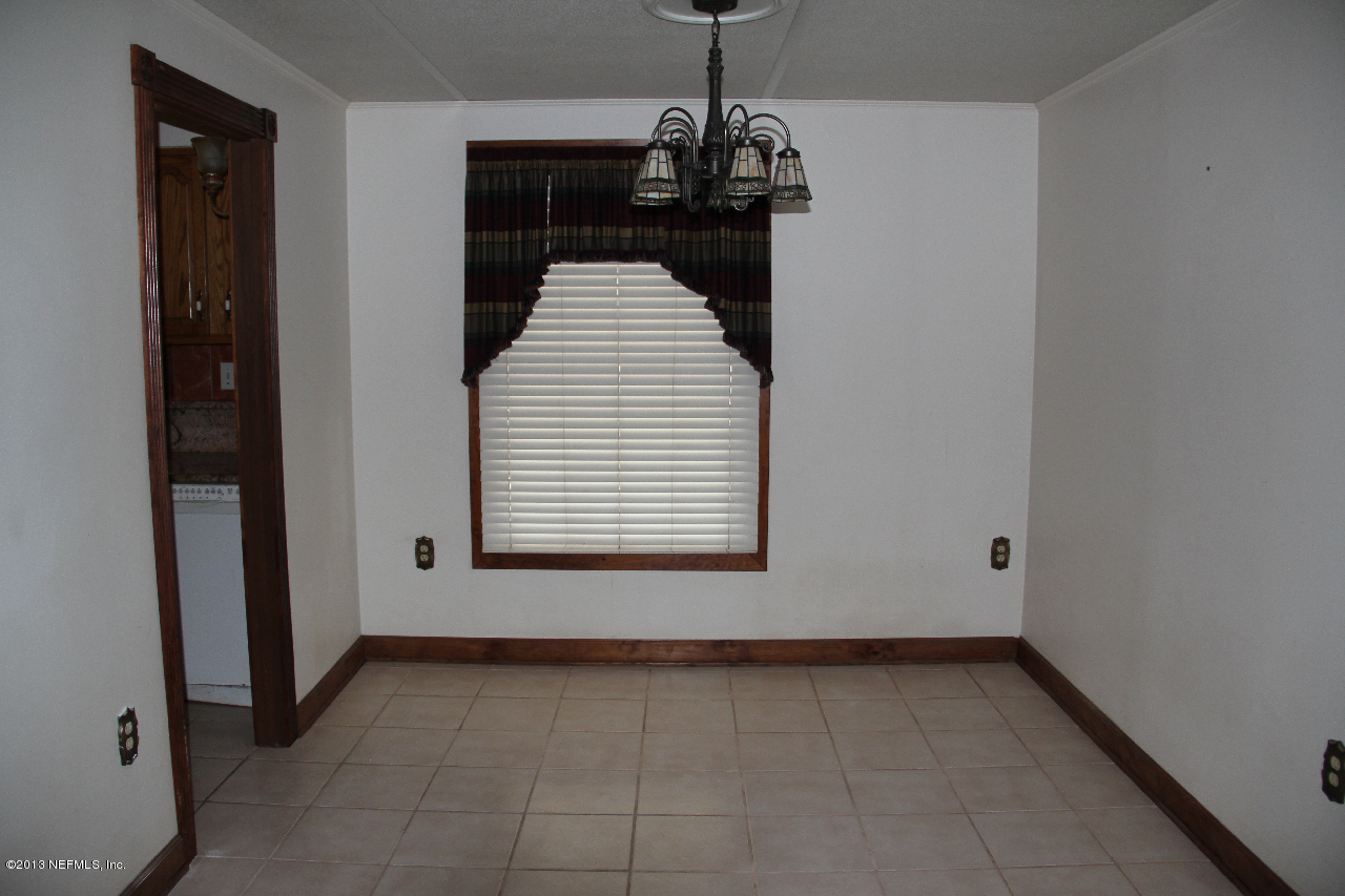 1991 Ryan Road St. Augustine, FL 32092 - Photo 10 of 39 a view of a hallway with a window