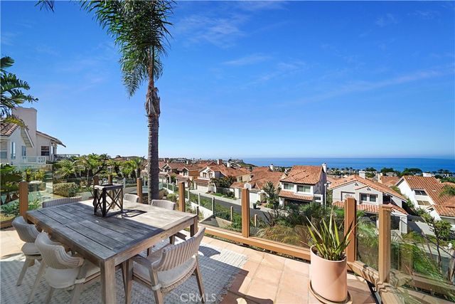 a view of a terrace with chairs
