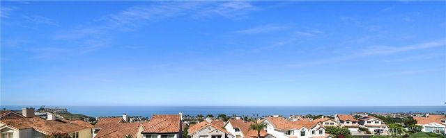 a view of a balcony with furniture