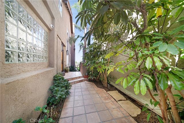 a view of a chairs and table in patio