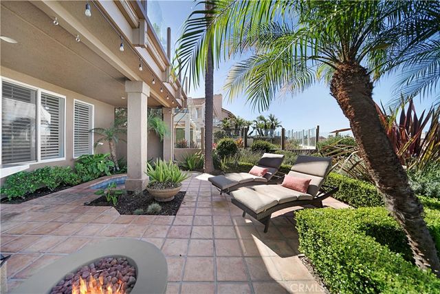 a bed room with a bed and a television