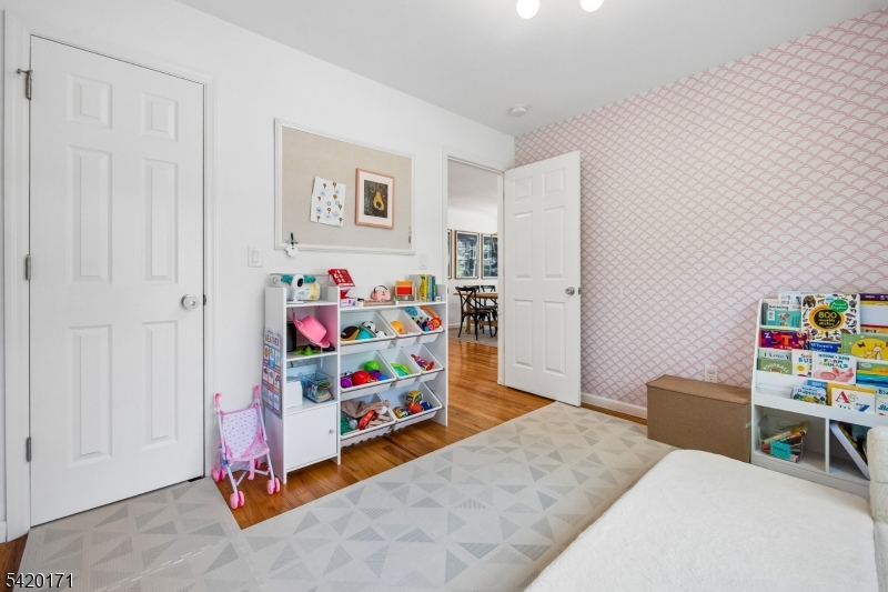 41 Milton Avenue Summit, NJ 07901 - Photo 23 of 39 a bedroom with bed and a window