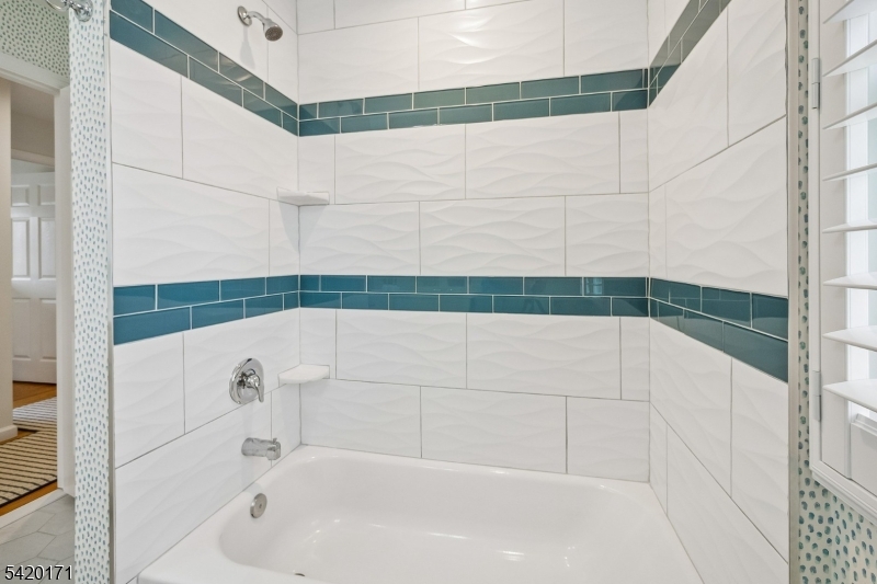 41 Milton Avenue Summit, NJ 07901 - Photo 27 of 39 a bathroom with a bathtub