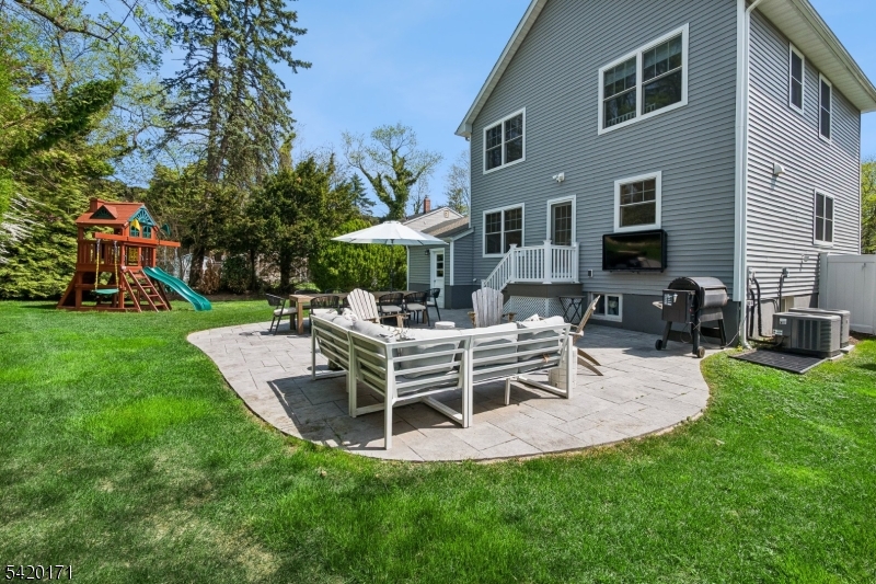 41 Milton Avenue Summit, NJ 07901 - Photo 36 of 39 a view of a house with backyard and sitting area