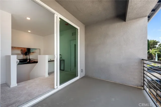 a view of a kitchen from the hallway