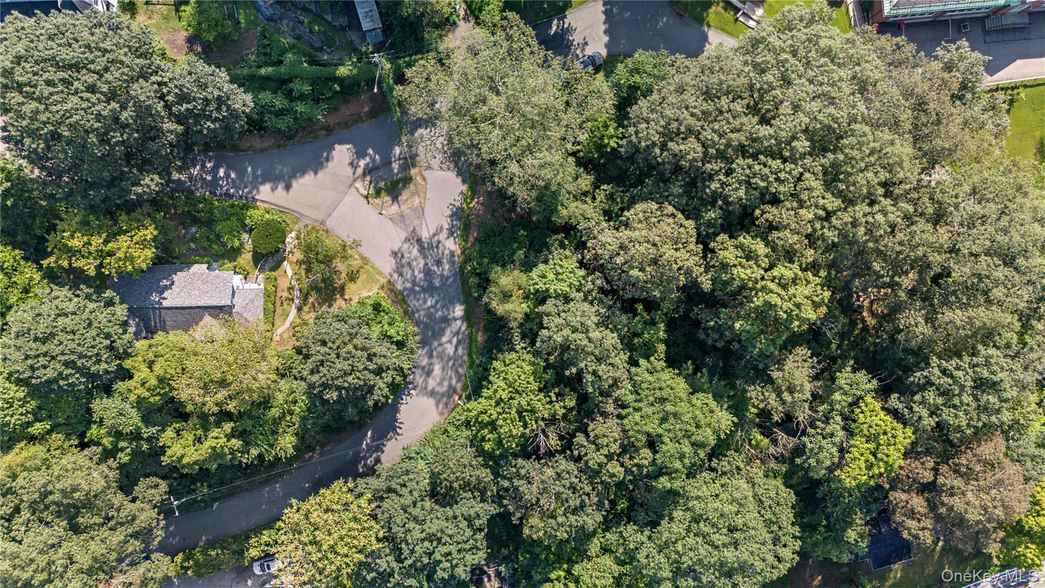 4 Owens Road Croton Falls, NY 10519 - Photo 2 of 3 an aerial view of residential house with outdoor space and trees all around