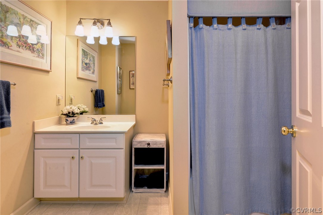 105 Mid Ocean Williamsburg, VA 23188 - Photo 24 of 36 a bathroom with a sink and a mirror