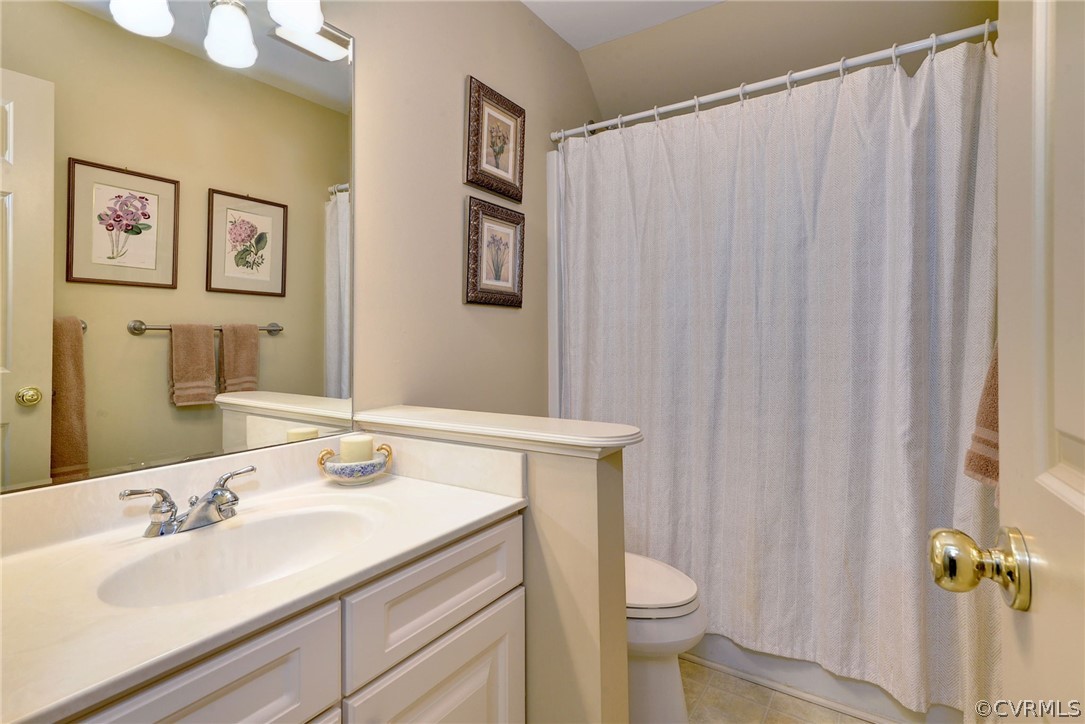 105 Mid Ocean Williamsburg, VA 23188 - Photo 27 of 36 a bathroom with a sink and a mirror