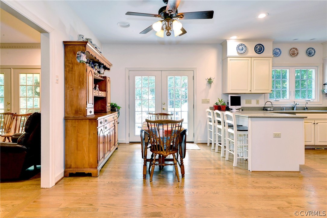 105 Mid Ocean Williamsburg, VA 23188 - Photo 8 of 36 a view of a dining room with furniture window and wooden floor