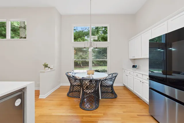 a view of a dining room with furniture window and outside view
