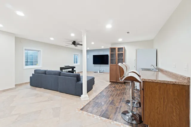 a living room with a couch and a flat screen tv