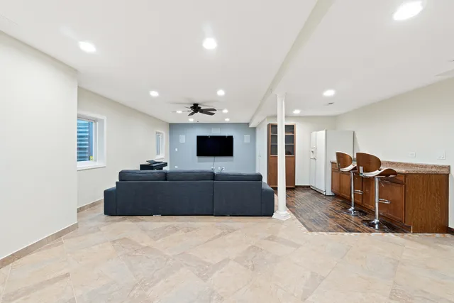 a view of livingroom with furniture wooden floor and window