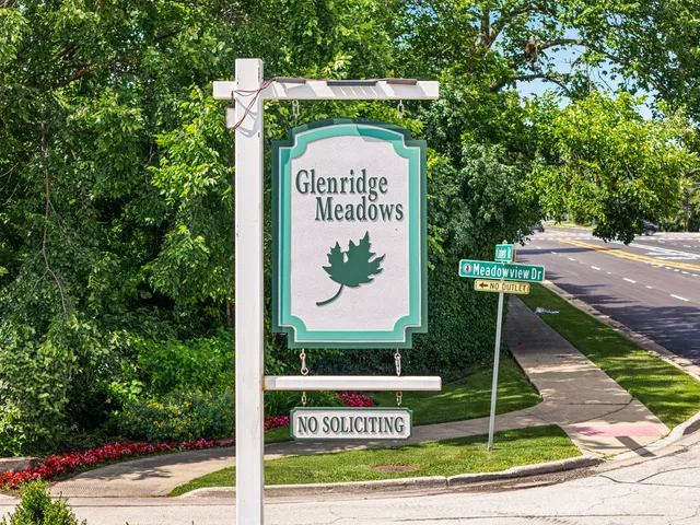 a sign on the side of the road