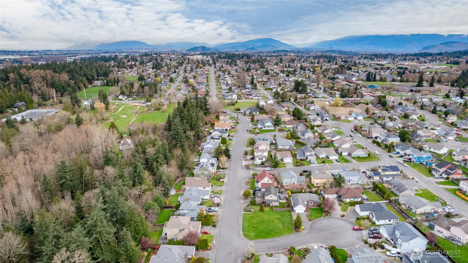 0 South 15th Street Mount Vernon, WA 98274 - Photo 6 of 10 an aerial view of residential houses with outdoor space and trees