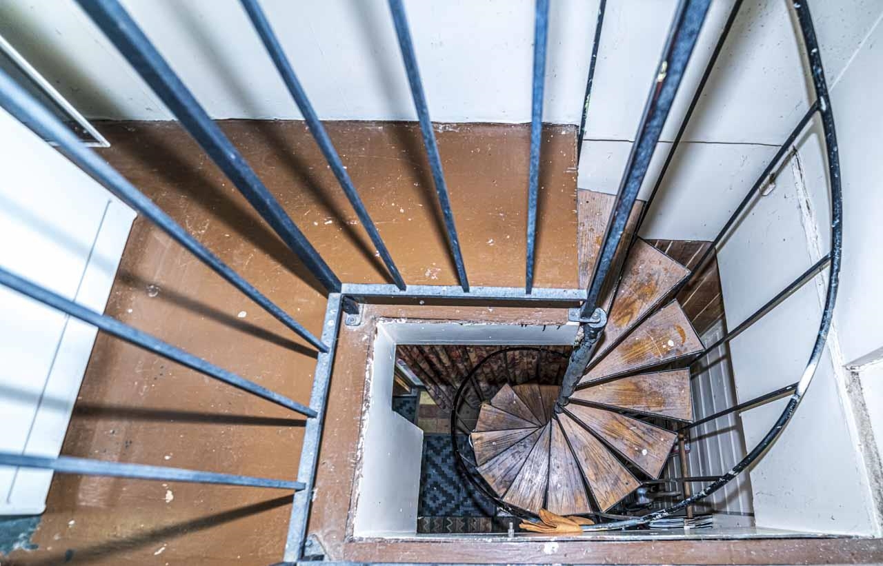 726 South Main Street Covington, TN 38019 - Photo 34 of 40 Second set of stairs that leads downstairs