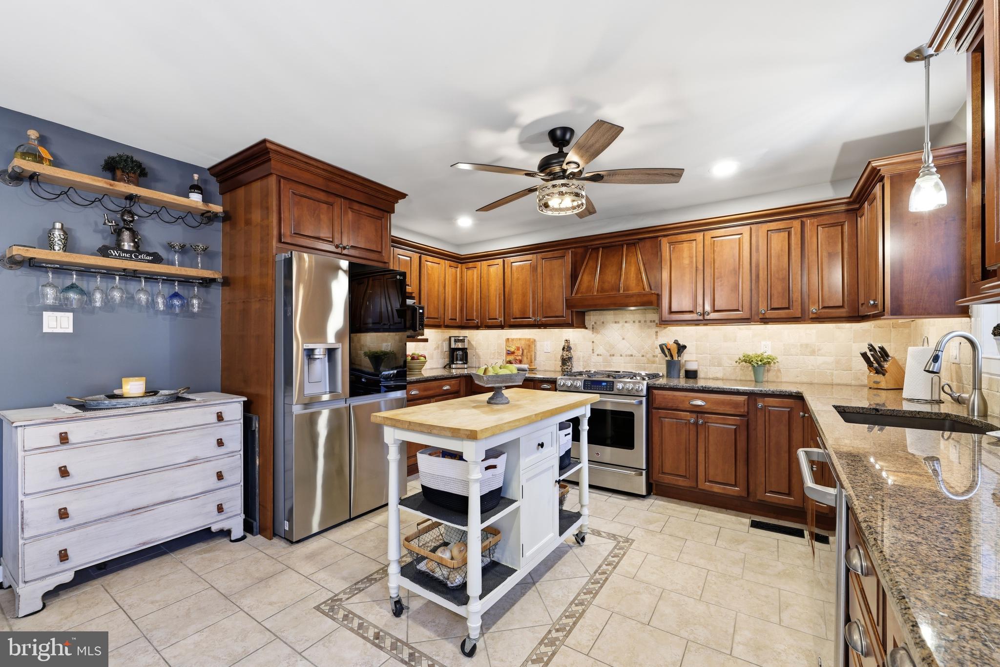 4 Prosit Lane Ocean View, NJ 08230 - Photo 15 of 29 a kitchen with a stove window and cabinet