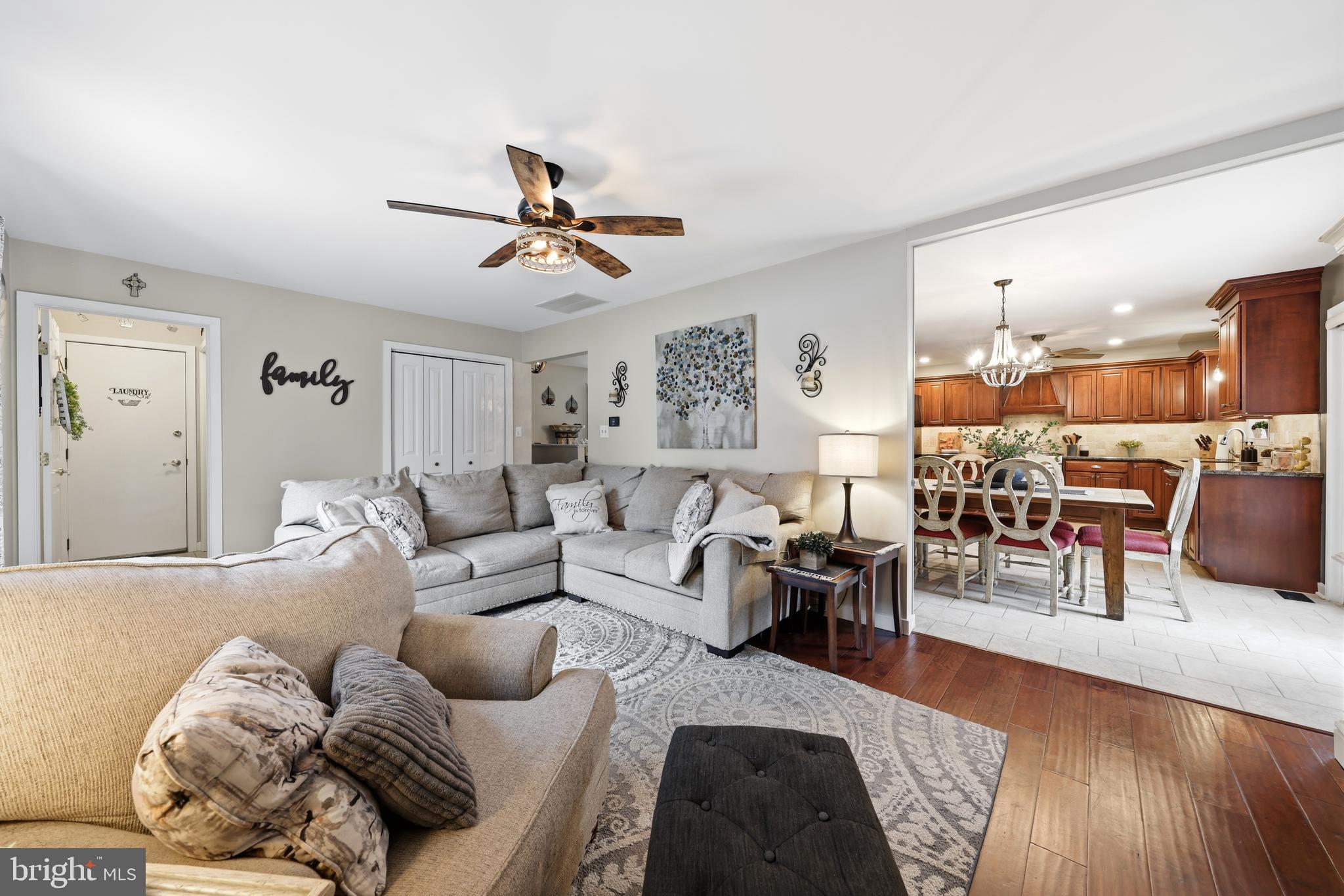 4 Prosit Lane Ocean View, NJ 08230 - Photo 17 of 29 a living room with furniture kitchen view and a wooden floor